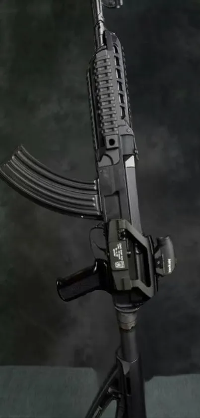 Sleek black rifle on a dark background wallpaper.