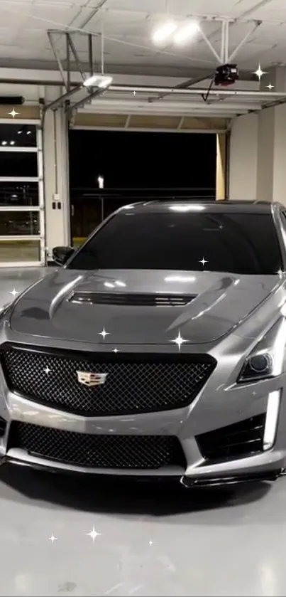 Sleek silver luxury car parked in a modern garage.