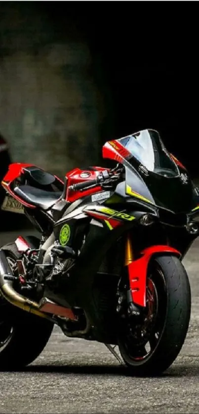 Vibrant black and red sportbike on a dark urban background.