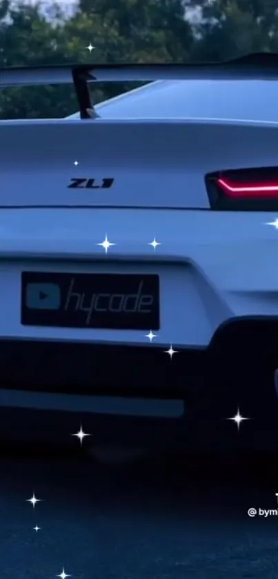 Sleek ZL1 sports car with illuminated tail lights in night view.