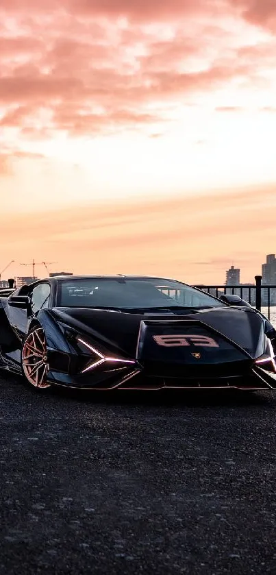 Sleek black sports car with sunset backdrop.