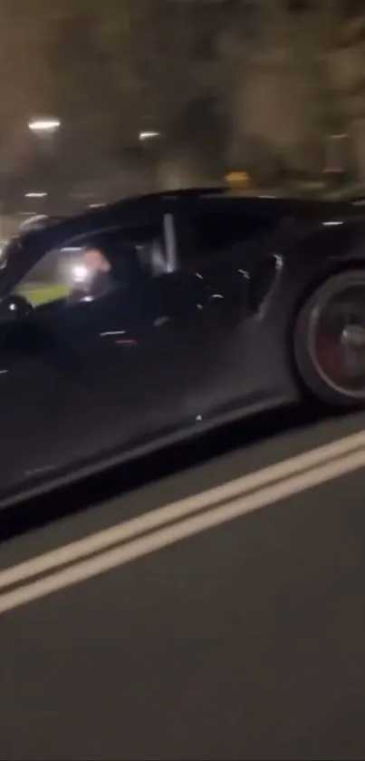 A sleek sports car speeding on a city street at night, capturing motion and style.