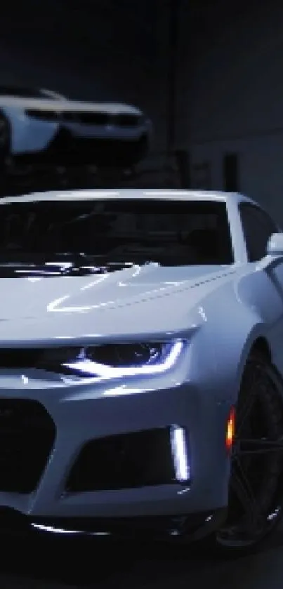 Sleek white sports car in a dimly lit garage.