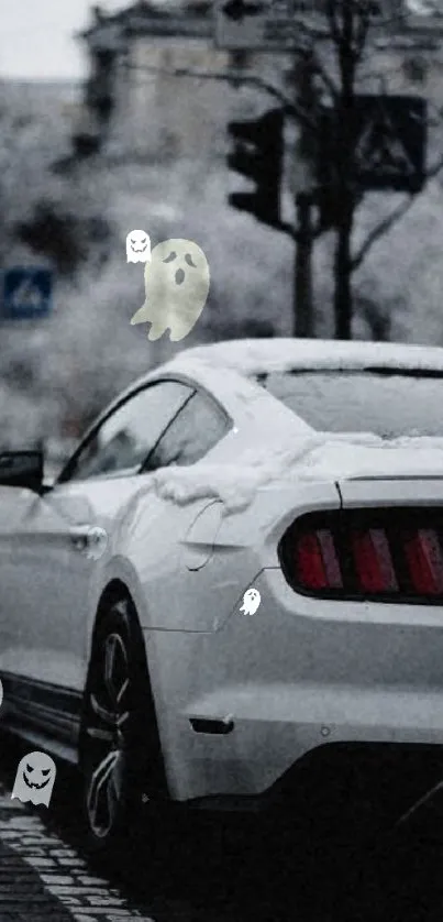 White sports car in snowy urban landscape.