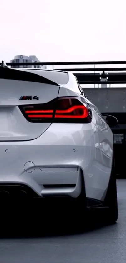 Rear view of a sleek, modern sports car in an urban setting.