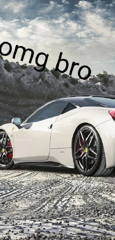 White sports car on rocky terrain under cloudy sky.