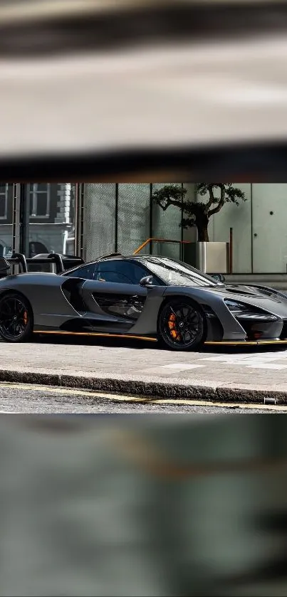 Sleek black sports car on urban street, luxury design.