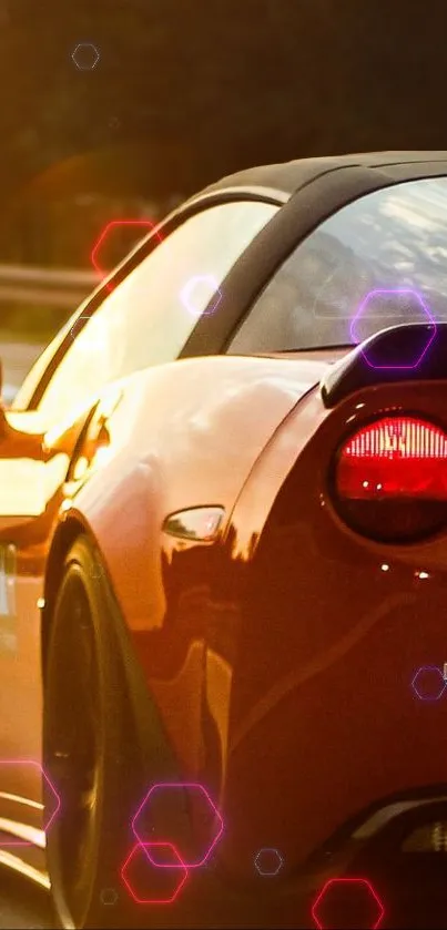 Sleek sports car at sunset with vibrant light reflections.