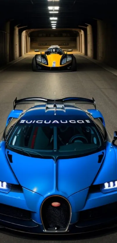 Blue sports car in a dimly lit tunnel with a yellow car in the background.