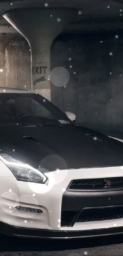 White sports car in an urban underground setting, shining under light.