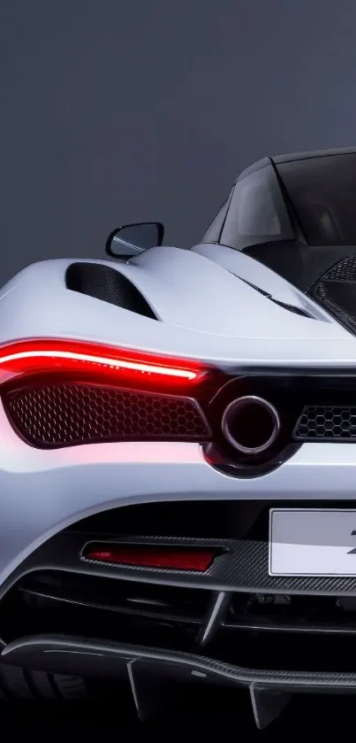 Sleek modern sports car with dynamic rear design and red taillights.