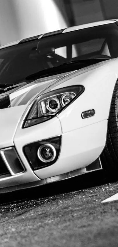 Black and white sports car wallpaper for mobile screens.