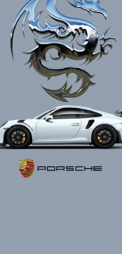 White Porsche with metallic dragon on a cool gray background.