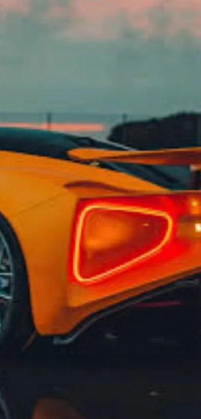 Orange sports car with dramatic lighting on a road.