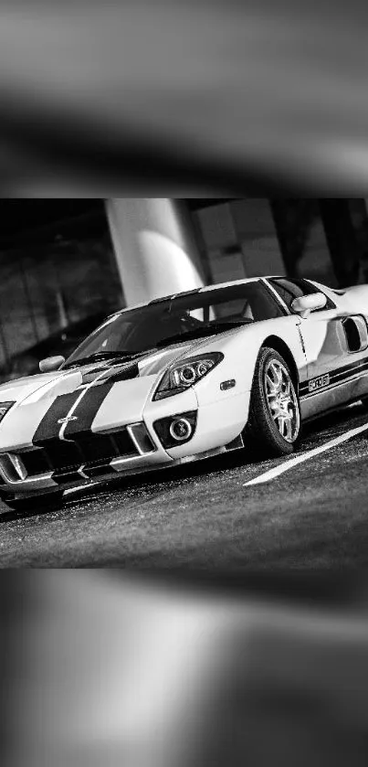 Black and white sports car in a parking space.