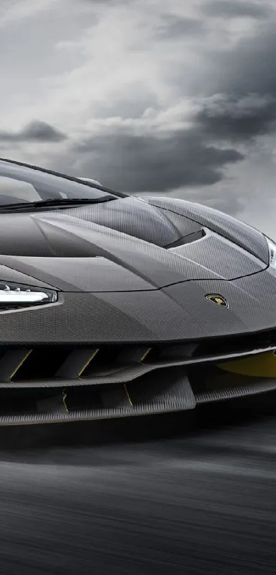 Sleek sports car on a highway with stormy sky backdrop.