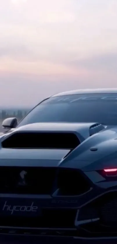 Futuristic sports car at dusk with glowing red tail lights.