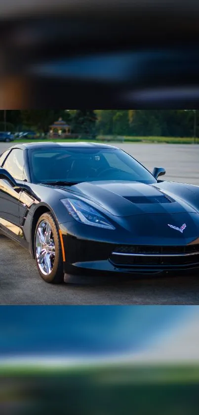 Black Corvette parked stylishly in evening light.