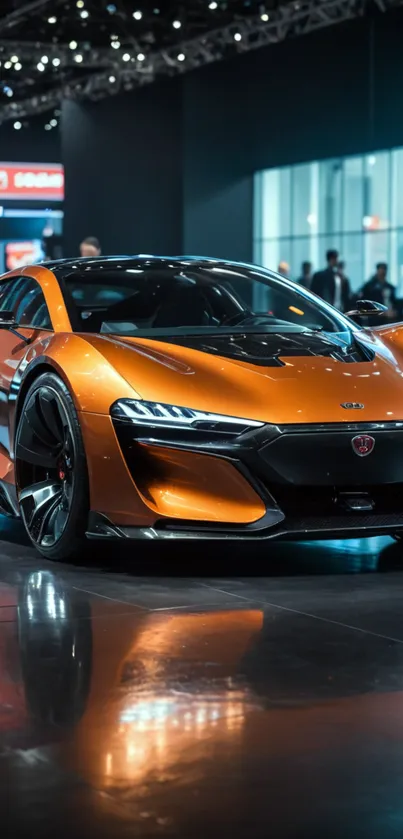 Orange sports car showcased at an auto show.