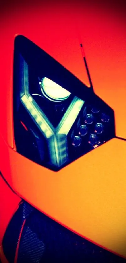 Close-up of a sports car's vibrant orange headlight with abstract color effects.