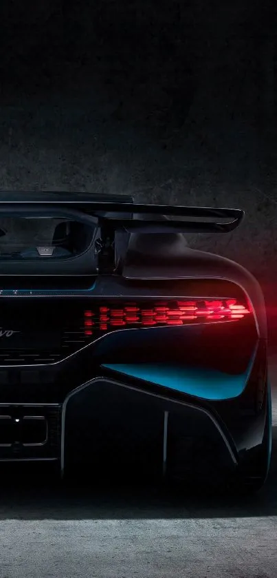 Sleek supercar with red taillights in dark background.