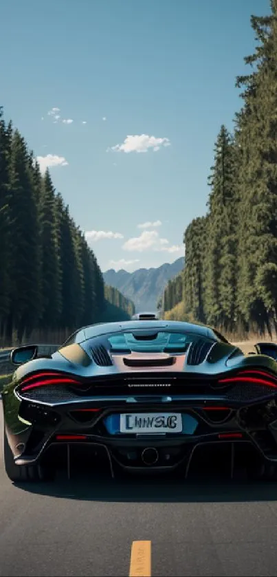 Sleek supercar driving on scenic, tree-lined mountain road.