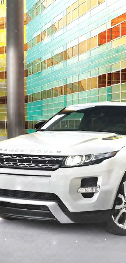 White SUV in front of a colorful urban building.