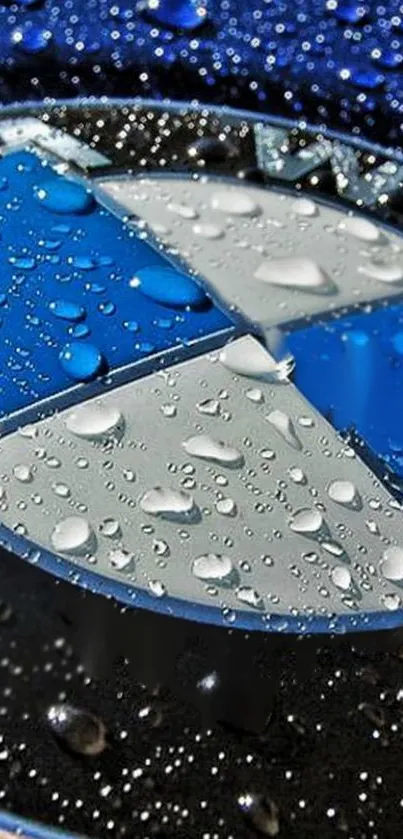 BMW logo with water droplets on blue background.