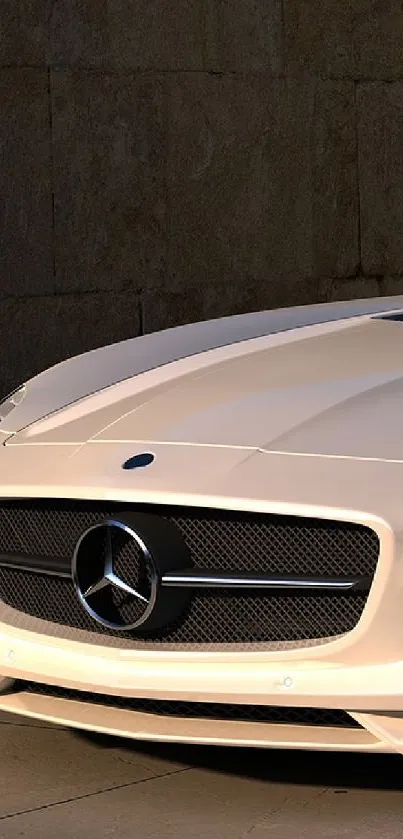 Sleek white Mercedes car front view with classic grille design.