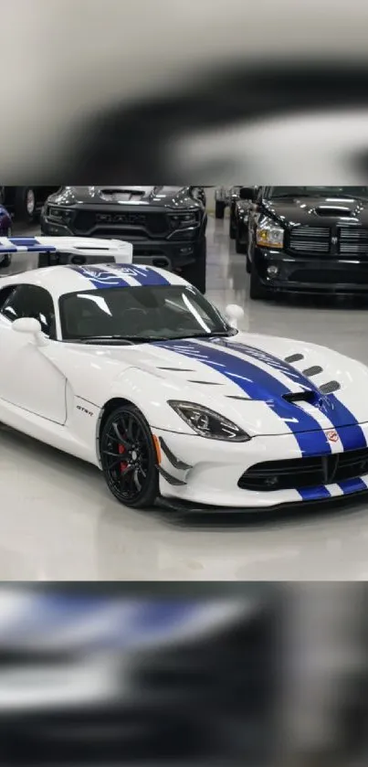 White sports car with blue stripes in a showroom setting.