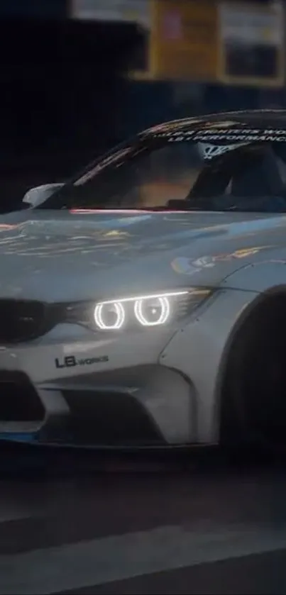 White sports car speeding through a night city landscape.