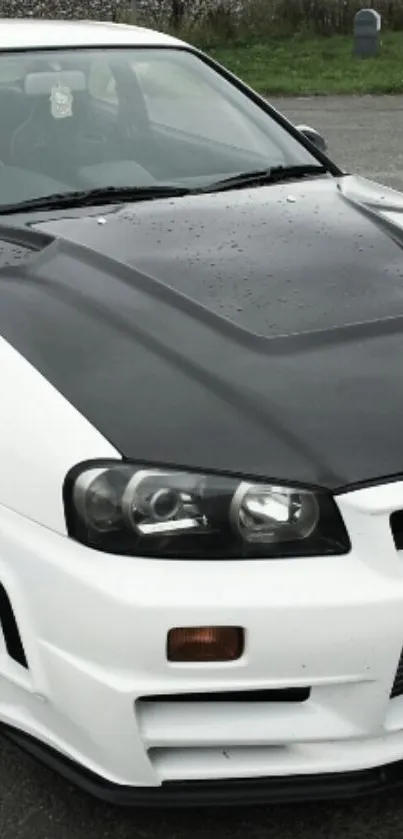 Black and white sports car with sleek design.