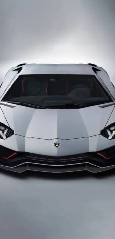 Front view of a sleek white sports car.