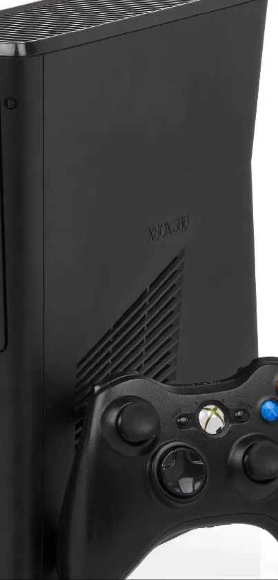 Xbox 360 with black controller on white background.