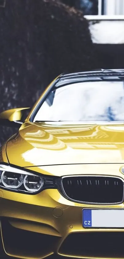 Yellow car with glossy finish in stylish mobile wallpaper.