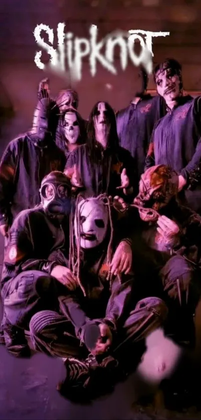 Slipknot band members group photo with dark, moody lighting in purple hues.