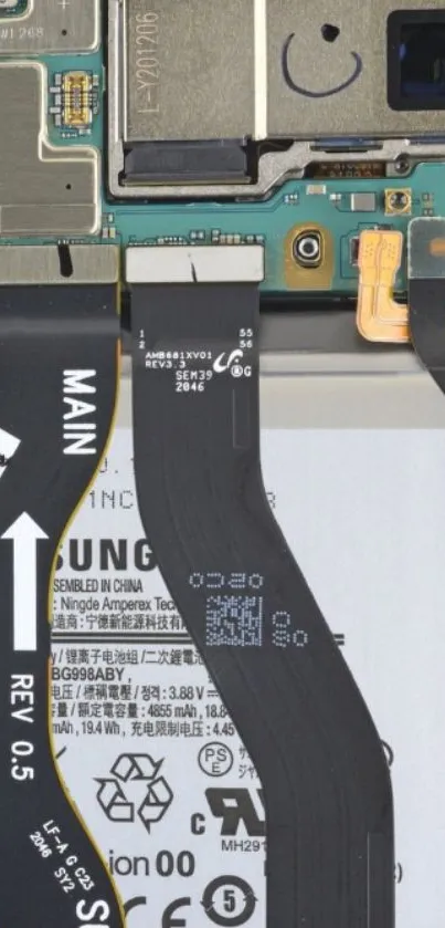 Close-up of smartphone circuitry showcasing detailed electronic components.