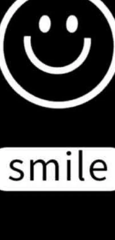 Black wallpaper with a white smiley face and the text "smile".