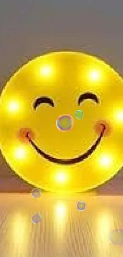 Cheerful yellow smiley face neon light on a soft-colored background.