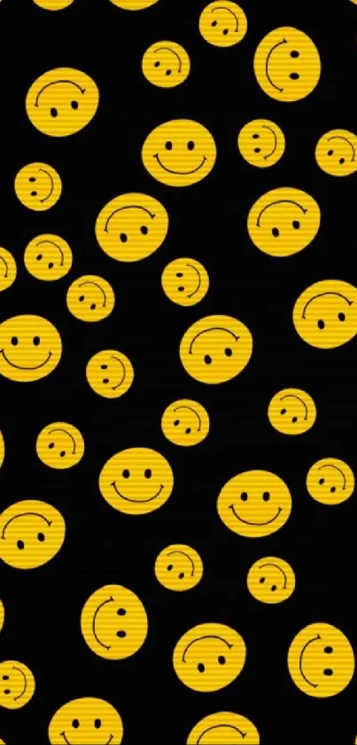 Mobile wallpaper with yellow smiley faces on black background.