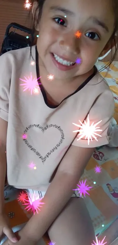 Smiling child with colorful star effects on wallpaper.