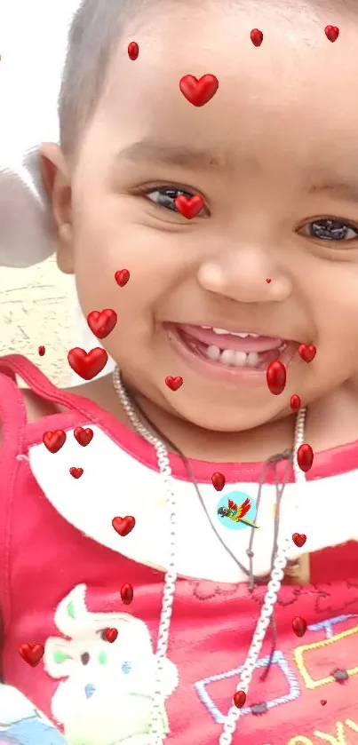 Smiling child with floating red heart effects, vibrant and playful wallpaper.