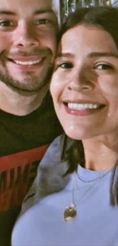Smiling couple close-up portrait wallpaper.
