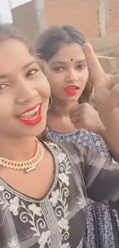 Two women enjoying a joyful outdoor selfie