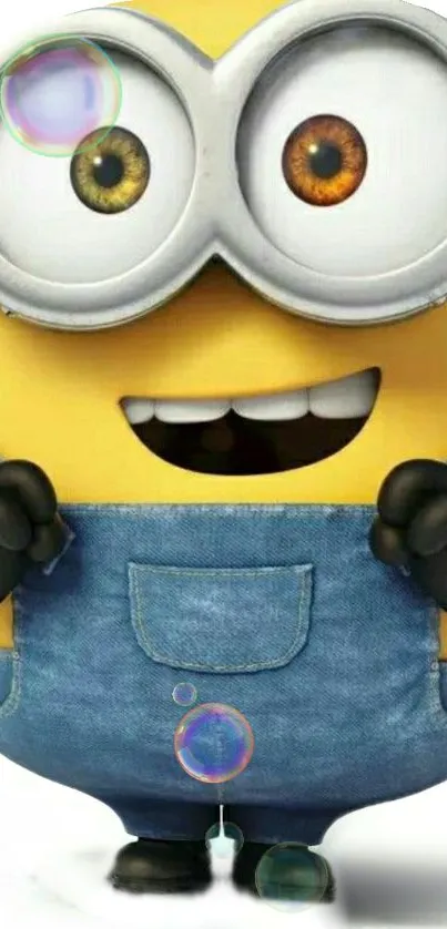 Smiling Minion in blue overalls with joyful expression.