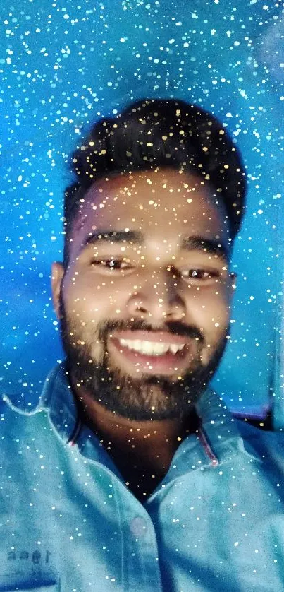 Smiling person under blue light, creating a joyful and calming wallpaper ambiance.