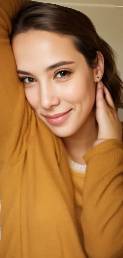 Smiling woman in a mustard sweater.