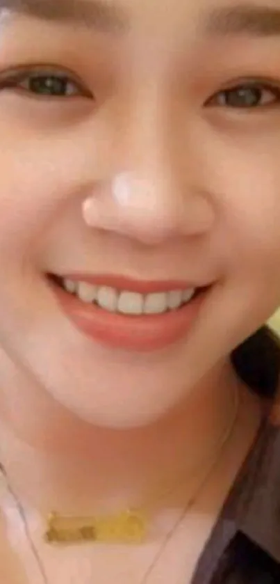 Smiling woman close-up portrait wallpaper.