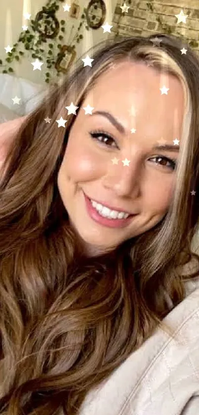 Smiling woman with brown hair and lush interior background.