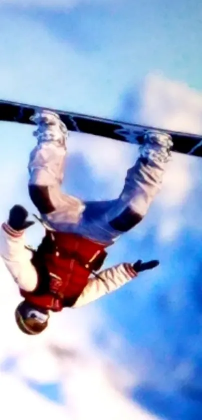 Snowboarder performs a mid-air flip against a snowy mountain backdrop.